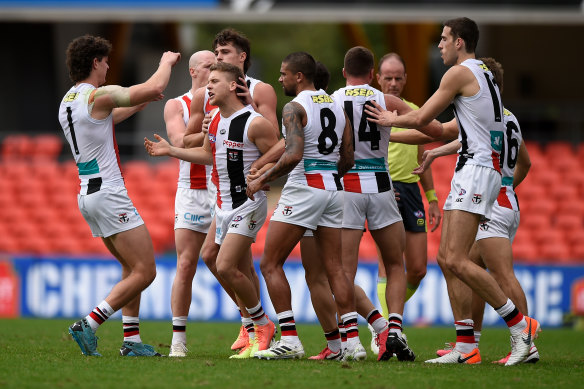 Jack Lonie celebrates a goal with teammates on Saturday. The Saints lost against Fremantle but have been playing an enterprising style.