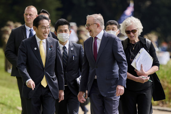 Japan’s Prime Minister Fumio Kishida, front left, walks with Australian Prime Minister Anthony Albanese in November. 