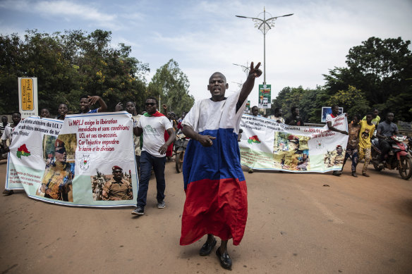 Young men chant slogans against the power of Lieutenant-Colonel Damiba, against France and pro-Russia, in Ouagadougou, Burkina Faso, on Friday.