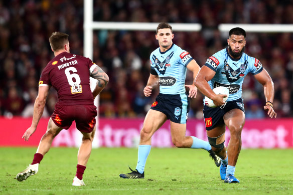 Payne Haas, right, playing in the blue of NSW, was the only Bronco in Origin II until his teammate Xavier Coates was recalled for Queensland.