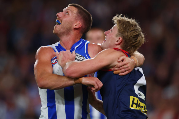 Aidan Corr (pictured here in a one-on-one battle with Jacob van Rooyen) has become a strong contributor at the Kangaroos after overcoming injury issues