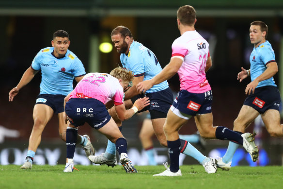 Jamie Roberts of the Waratahs in action  against the Rebels.