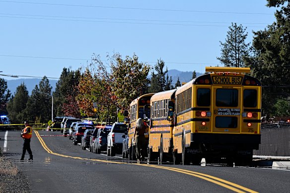 Buses lined up outside the school.
