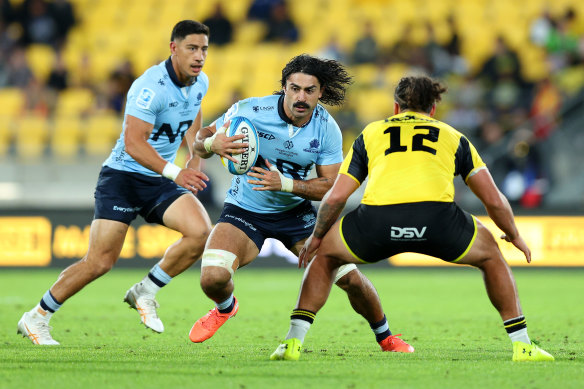 Charlie Gamble takes a carry. 