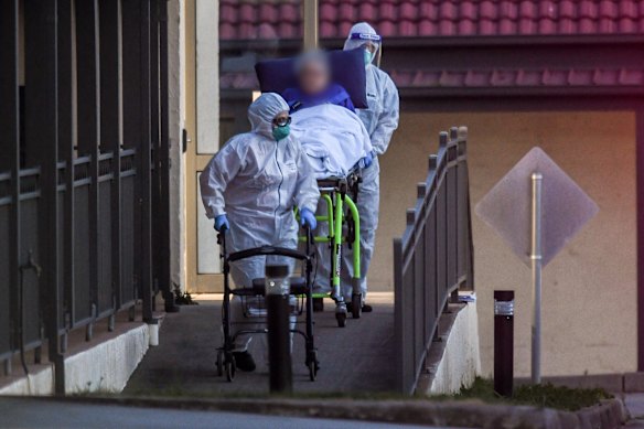 The last of the residents from St Basil's Home for the Aged in Melbourne's north are evacuated to hospitals last Friday.