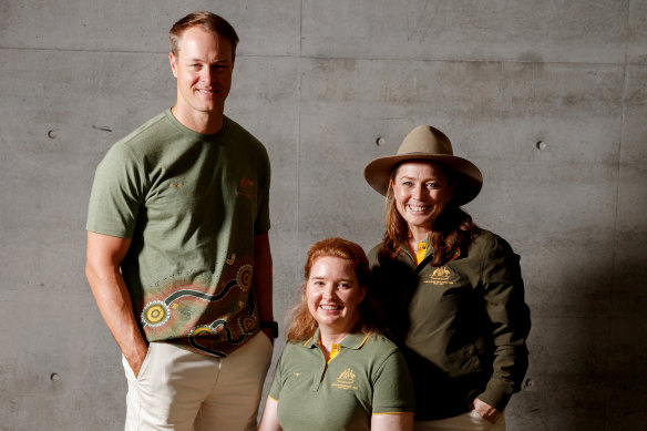 McGrath and Angie Ballard model the Paris 2024 uniform with chef de mission Kate McLoughlin (right).