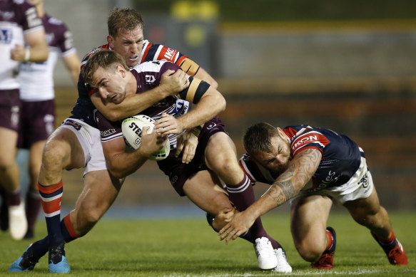 Close contest: The clash between the Roosters and Sea Eagles in March just before the season shutdown.