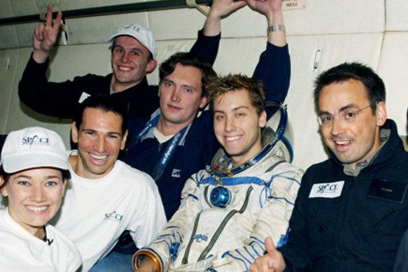 Former NSYNC member Lance Bass (centre) trained to be a cosmonaut in 2002.