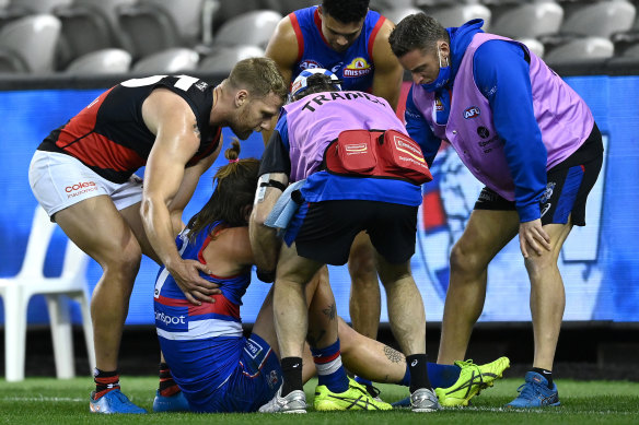 Josh Bruce is attended to after the siren.