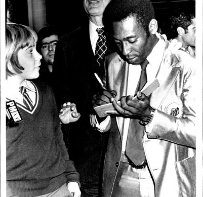 Pele signs an autograph after arriving in Sydney in June 1972.