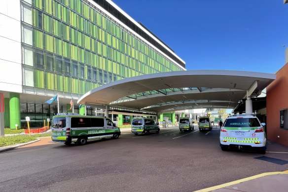 Ambulances wait outside of the emergency department at Sir Charles Gairdner Hospital. 