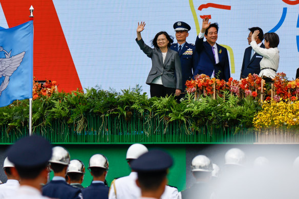 President William Lai Ching-te (centre), Vice President Hsiao Bi-khim (right) and Former Taiwanese president Tsai Ing-Wen wave during the Taiwanese Presidential Inauguration Ceremony.