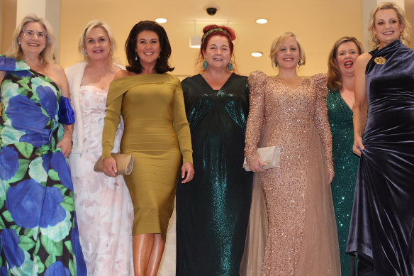 Jane Hume (third from left) rocked a bodycon dress as she posed with other Coalition MPs and senators at the Midwinter Ball.