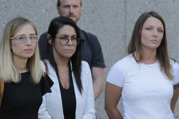 Epstein accusers Annie Farmer, left, and Courtney Wild, right, outside a New York courthouse last year.