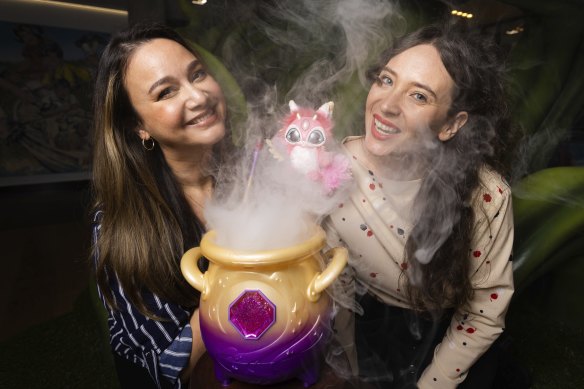 Yvette Sittrop (left) and Jenni Townsend of Moose Toys, with the magic cauldron, and its adorable critter, that caught the world’s imagination.