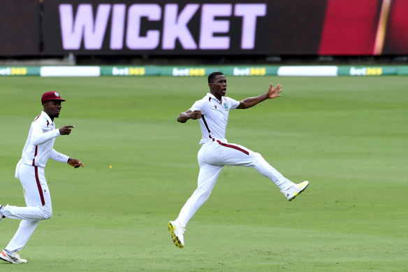 Shamar Joseph celebrates Alex Carey’s scalp.