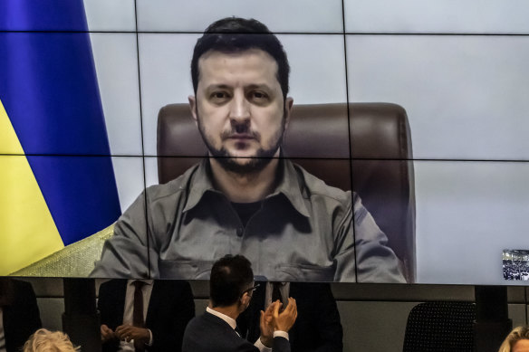 Ukrainian President Volodymyr Zelensky addresses Germany’s national parliament, the Bundestag, via live video.