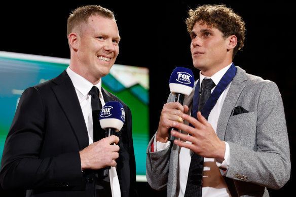 Retired Richmond spearhead Jack Riewoldt with Carlton’s Charlie Curnow.