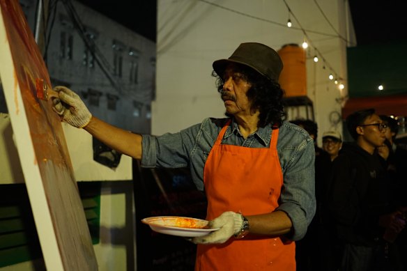 Indonesian artist and activist Tisna Sanjaya at work.