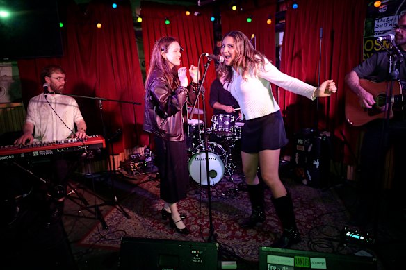 Dream gig: Niamh Troy (left) and Avalon Johnstone sang in the Espy basement bar, backed by a professional band.