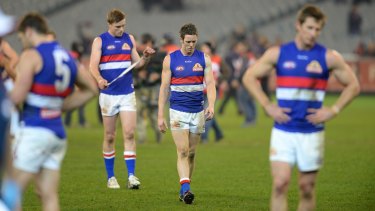 Bob Murphy and the Bulldogs after a loss in 2013.