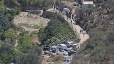 The sight of an explosion near the Israeli settlement of Dolev, west of the West Bank city of Ramallah, in August.