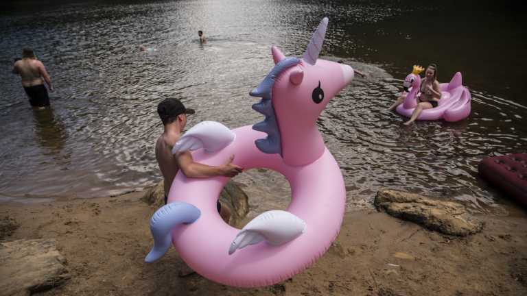 Locals cool off at Bents Basin in western Sydney. 