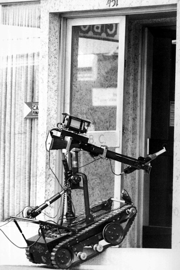 Deployed … The Army’s remote control bomb disposal device enters the bank.