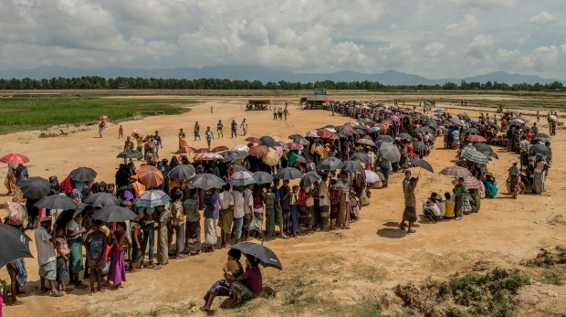 Refugees line up to register near the Nayapara refugee camp in Cox's Bazar, Bangladesh. 