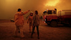 RFS firefighters getting ready to defend properties in Bumbalong, NSW, on Saturday.