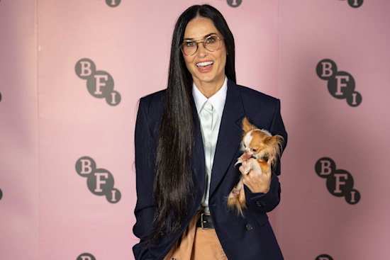 Demi Moore, with micro chihuahua Pilaf, nails the barrel-leg and cinched-blazer combo.