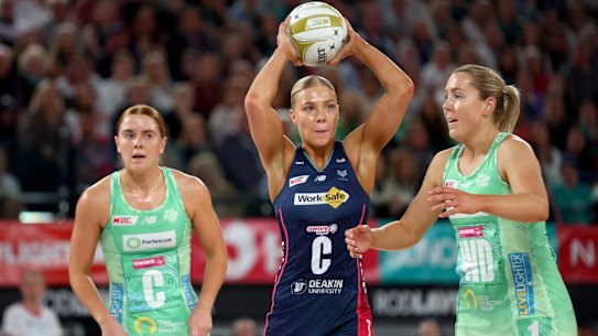 Melbourne Vixens skipper Kate Moloney passes the ball during the Super Netball grand final against West Coast Fever in August.