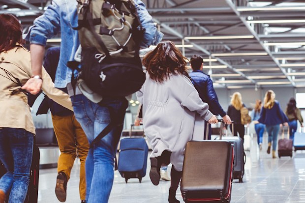 running with luggage in the airport