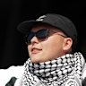 Mo Chara of Kneecap performs at the Glastonbury music festival. The band’s set is now under police investigation.
