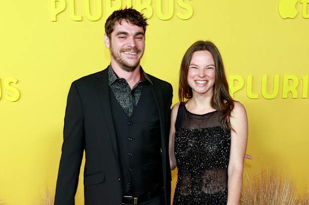 LOS ANGELES, CALIFORNIA - NOVEMBER 04: (L-R) RJ Mitte and Kennedy Suarez attend the world premiere of Apple TV+’s “Pluribus” at DGA Theater Complex on November 04, 2025 in Los Angeles, California. (Photo by Frazer Harrison/Getty Images)