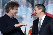 Cartoonist David Rowe talks shop with Treasurer Jim Chalmers in Canberra.