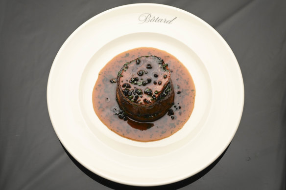 Tournedos Rossini with truffled Madeira and topped with foie gras.