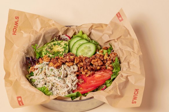 The shop sells sandwiches and salads. 