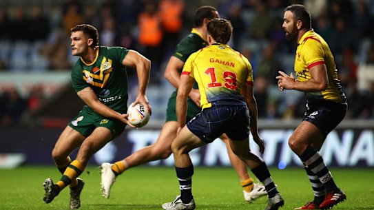 Nathan Cleary looks for a pass during the Rugby League World Cup match between Australia and Scotland.