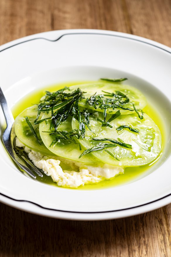 Stracciatella, green tomatoes, herb oil and salty crispy fried tarragon.