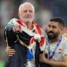 Iraq’s coach Graham Arnold celebrates World Cup qualification. 