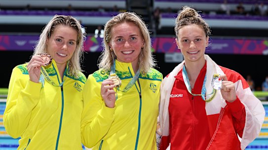 Australia’s Kiah Melverton (left) won bronze with rising Canadian star Summer McIntosh second.
