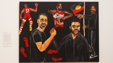 Artist Vincent Namatjira's 2020 Archibald Prize-winning portrait of himself and Adam Goodes.
