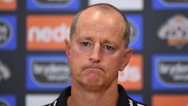 The Wests Tigers have delayed a decision on the future of coach Michael Maguire.