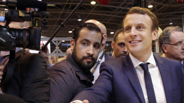 Then presidential candidate Emmanuel Macron, front right, flanked by his bodyguard Alexandre Benalla  in Paris last year.
