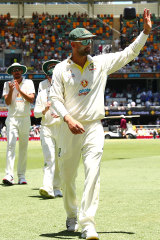 Nathan Lyon leaves the field after claiming his 400th Test wicket.