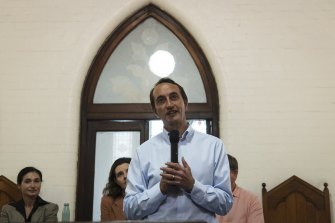 Dave Sharma attends a Meet the Candidates event on Saturday. 