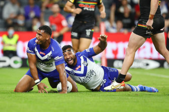 Tevita Pangai jnr sticks his tongue out after scoring, but it was one of the few highlights for the Dogs.