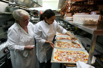 Apprentice chef Marcela Aviles with Giovanna Toppi in the kitchen at Machiavelli.