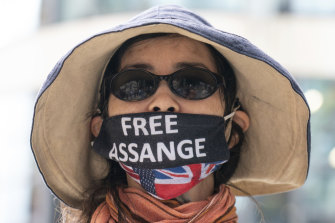 A supporter of Wikileaks founder Julian Assange protest outside the Home Office in London, on Friday.